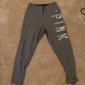 Gray leggings stops right below the calf.